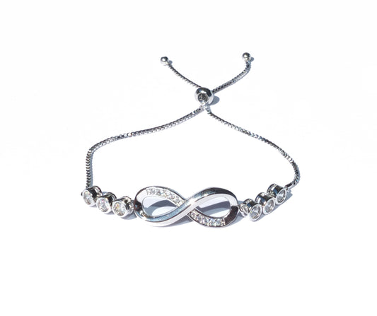 Bracelet avec symbole infini et paillettes