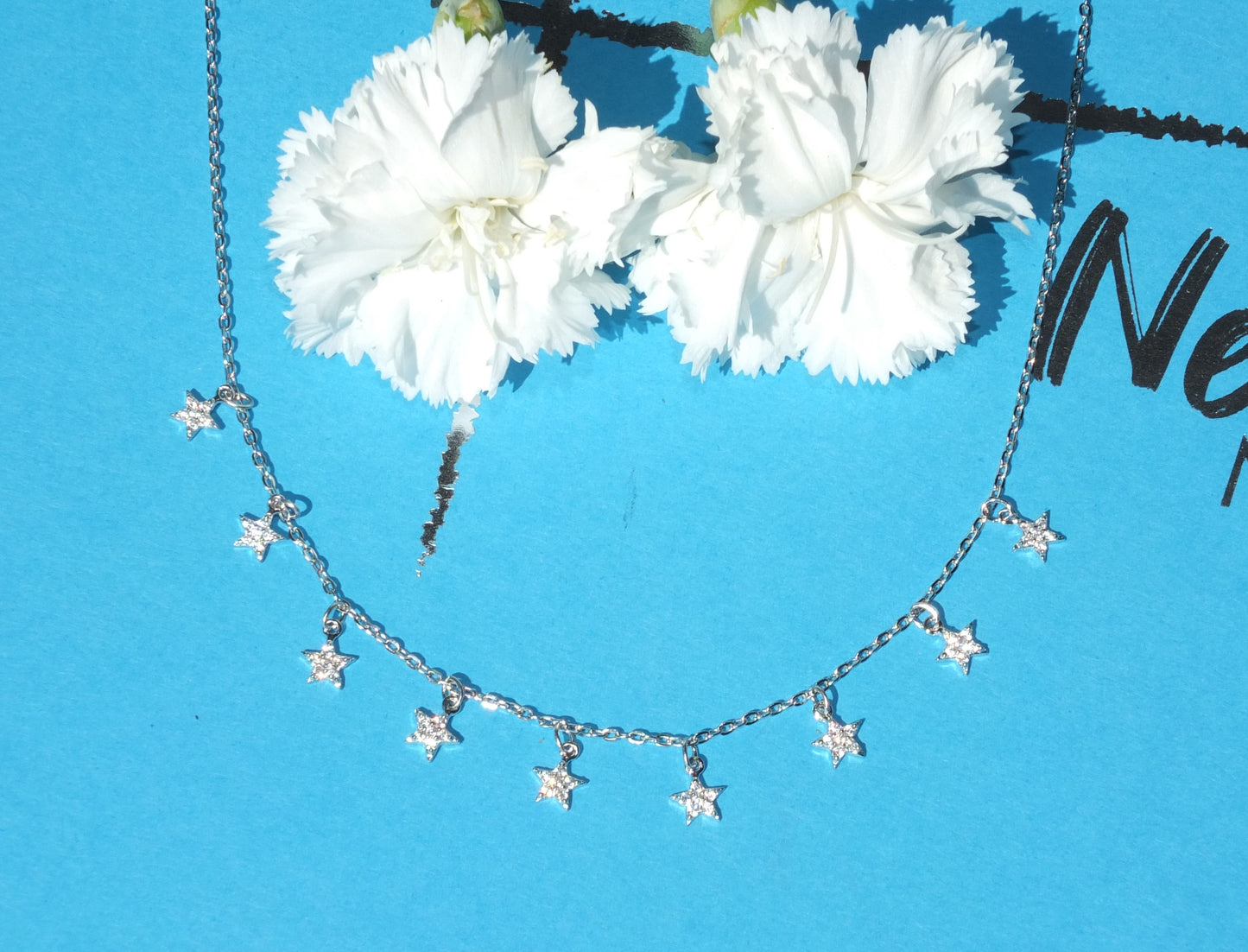 Collier avec étoiles et paillettes